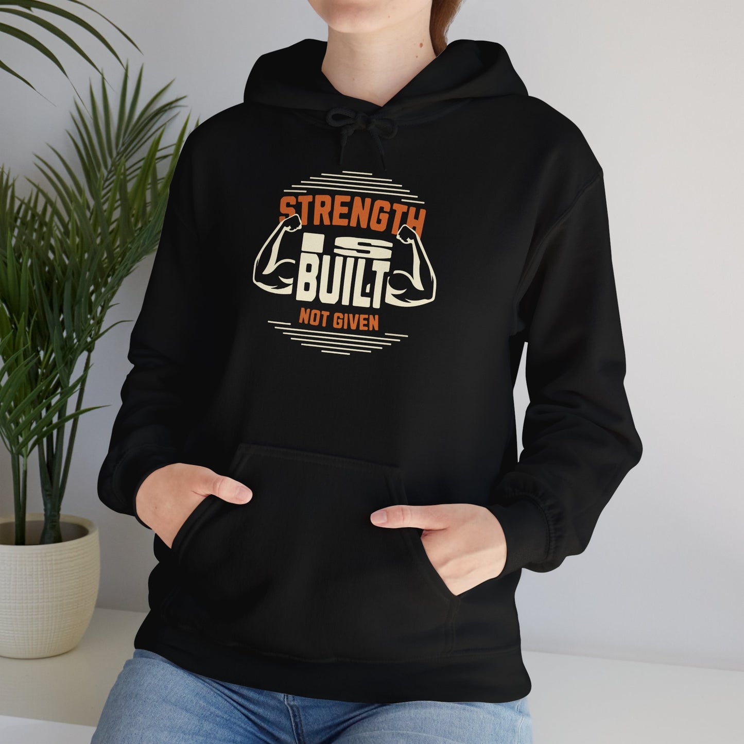 unisex heavy blend™ hooded sweatshirt - strength is built not given - motivational gym quote