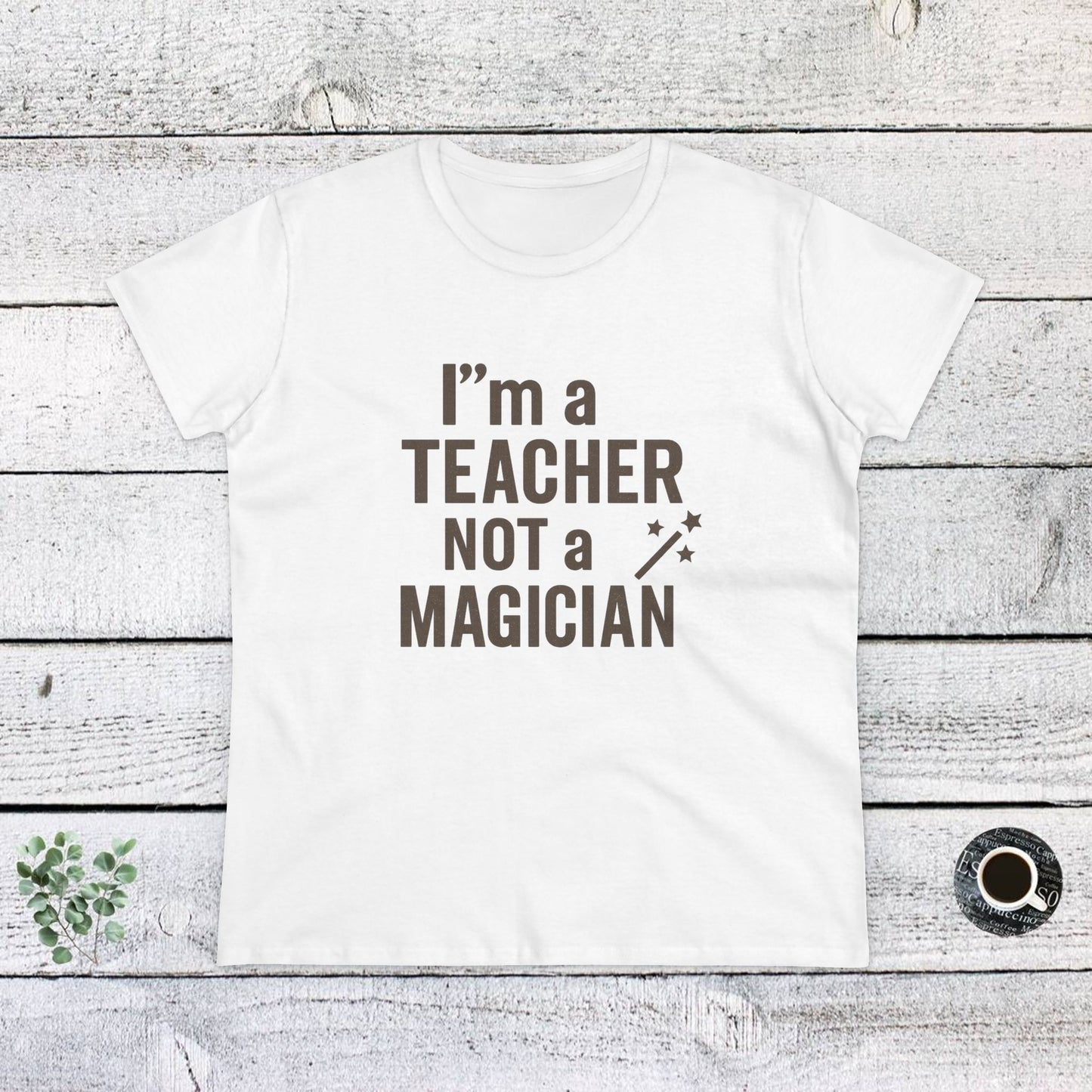 women's cotton tee - i'm a teacher not a magician. teachers with attitude.