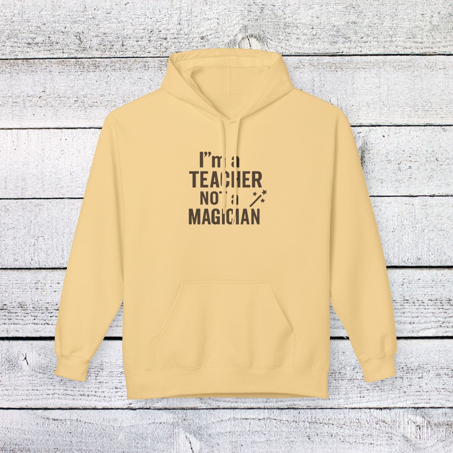 unisex softstyle hoodie - i'm a teacher not a magician design. teachers with attitude.